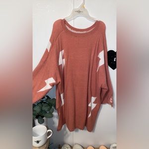 Distressed pink graphic oversized sweater